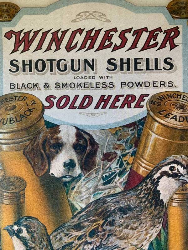 lot 318 image: Metal Winchester Dog  Bird Sign