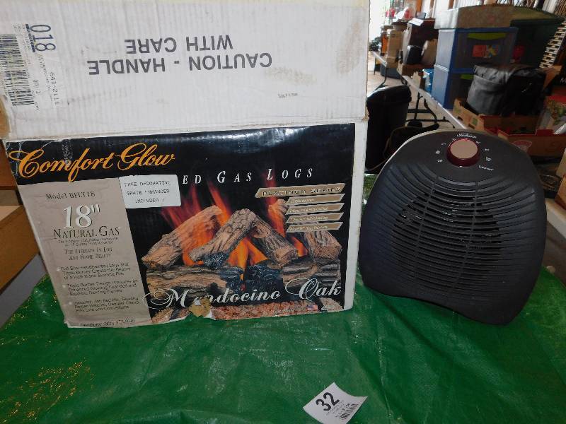 lot 32 image: Indoor Heater and Fireplace Logs