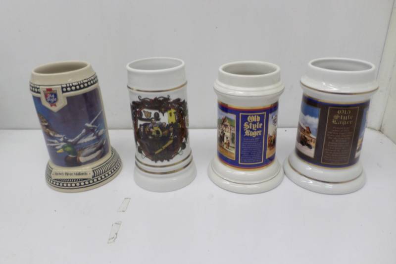lot 68 image: 4 Old Style Steins