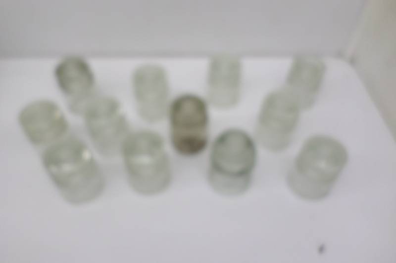 lot 76 image: 12 Vintage Insulators