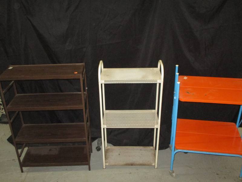lot 97 image: 3 Metal Shelves Brown 23 12 x 9 12 x 3 ft white 18 12 x 9 12 x 37  orange 23 x 16 x 34