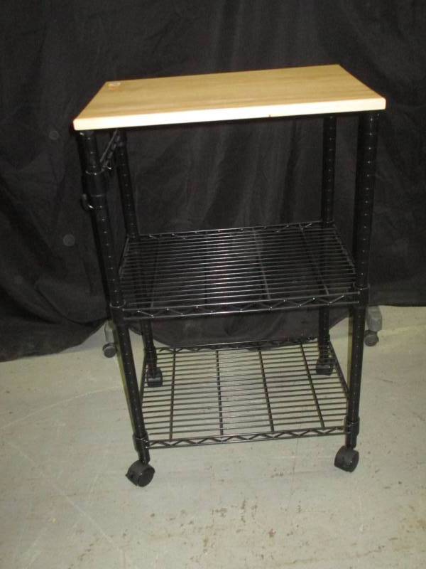 lot 98 image: Kitchen Cart on wheels and hooks on the side 21 x 15 x 34 12