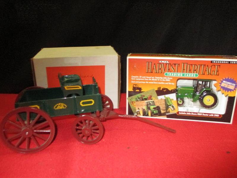 lot 130 image: John Deere Buckboard Wagon, and 1 set of Ertle harvest Heritage Trading Cards