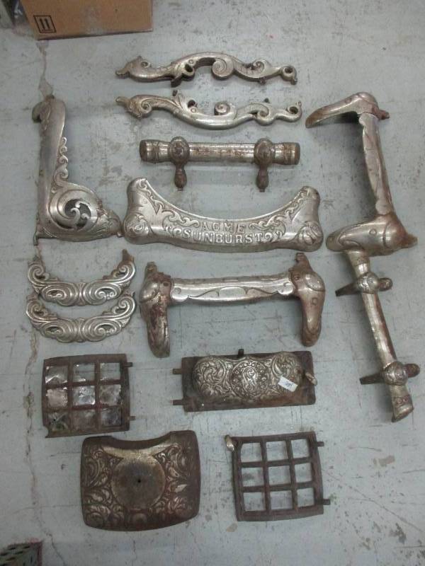 lot 156 image: Antique Acme Sunburst Cast Iron Pieces to a Stove