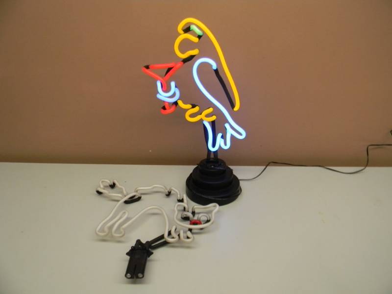 lot 37 image: VINTAGE NEON LIGHT - PARROT WITH CAT THEY CAN BE SWITCHED OUT - BOTH WORK - APPROX 16 BY 11 - SEE PICTURES