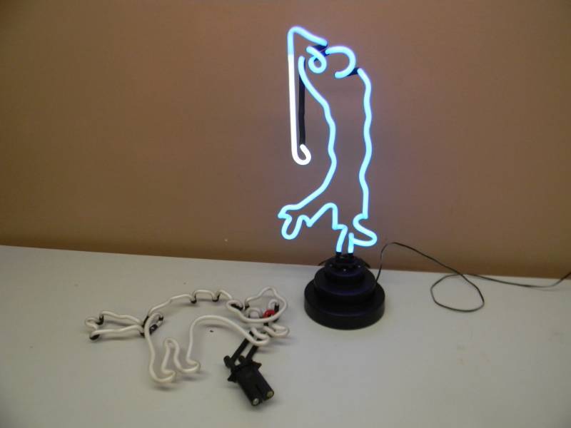 lot 39 image: VINTAGE NEON LIGHTS - GOLFER GUY WITH CAT- BOTH WORK - APPROX 16 BY 11 - SEE PICTURES