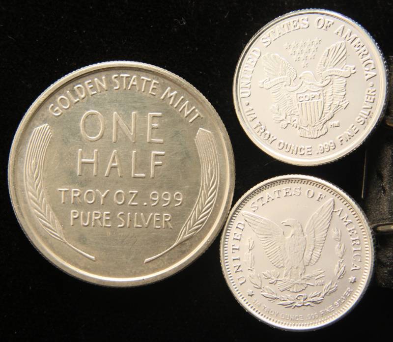 1 TROY OZ. .999 FINE SILVER (1 X 12 OZ & 2 X 14 OZ)