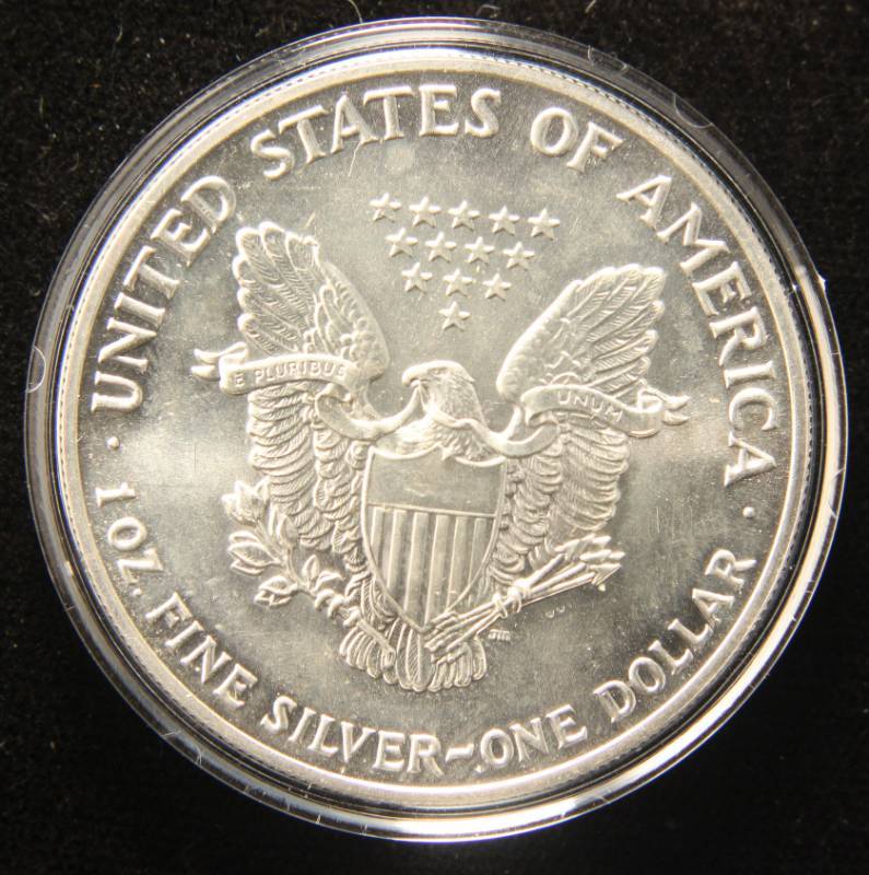 1990 AMERICAN SILVER EAGLE 1 TROY OZ. .999 FINE SILVER IN AIRTITE