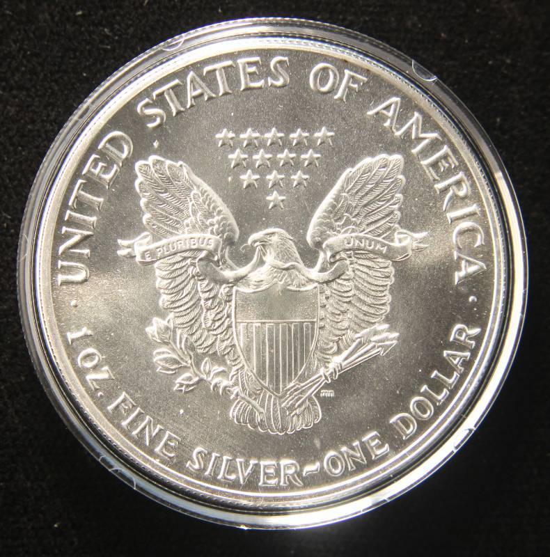 1987 AMERICAN SILVER EAGLE 1 TROY OZ. .999 FINE SILVER IN AIRTITE