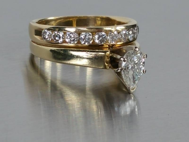Ladies Pear Cut Diamond Estate Ring with Channel Set Round Diamond Band in 14k Yellow Gold