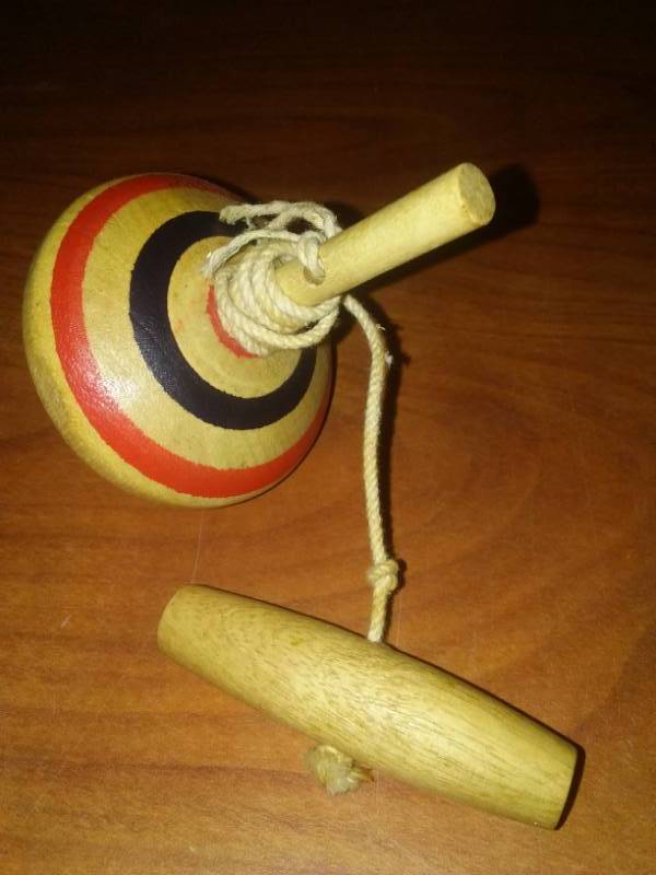 wooden top with pull string