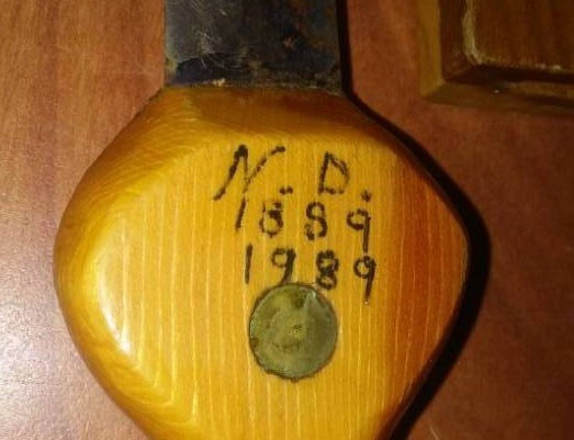 lot 72 image: ND Centennial knife and wood sheath.