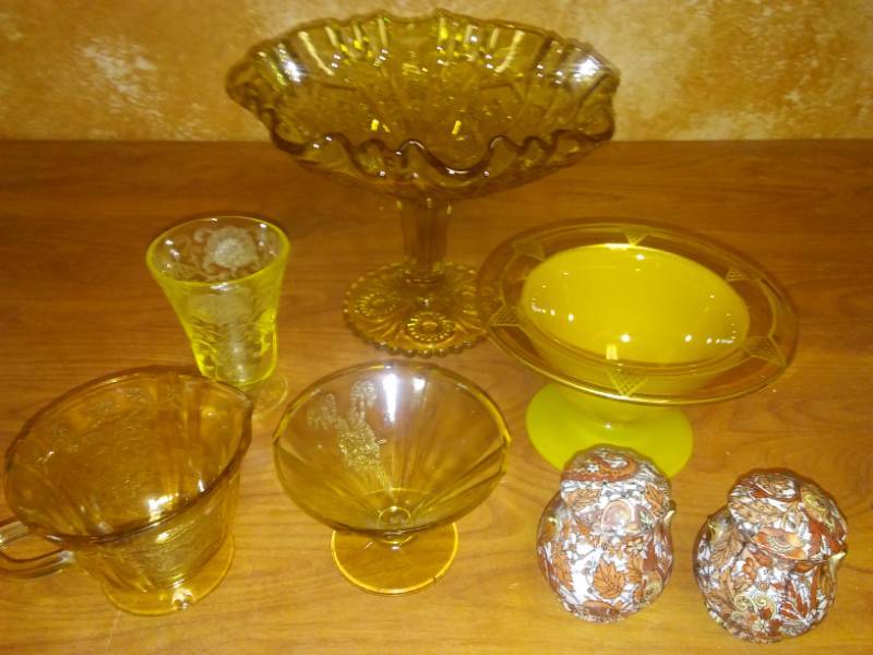 lot 74 image: Amber depression glass and more.