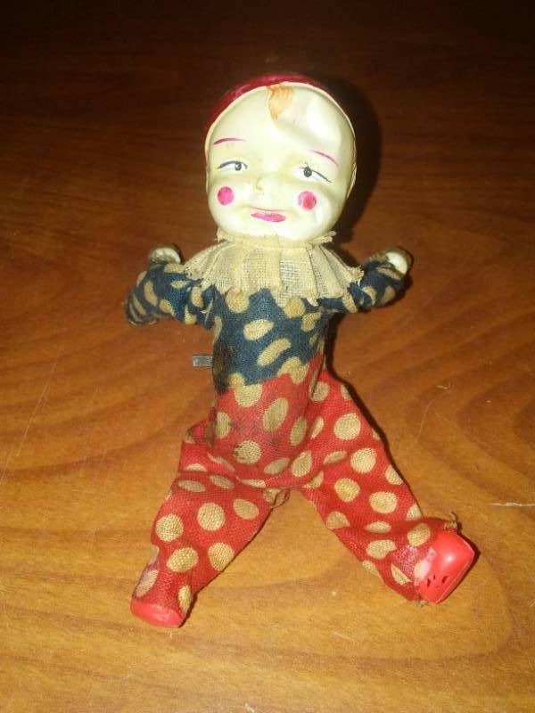 lot 136 image: Vintage wind-up Clown