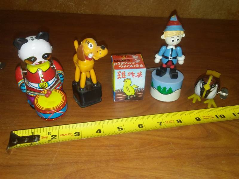 lot 144 image: Five mechanical toys