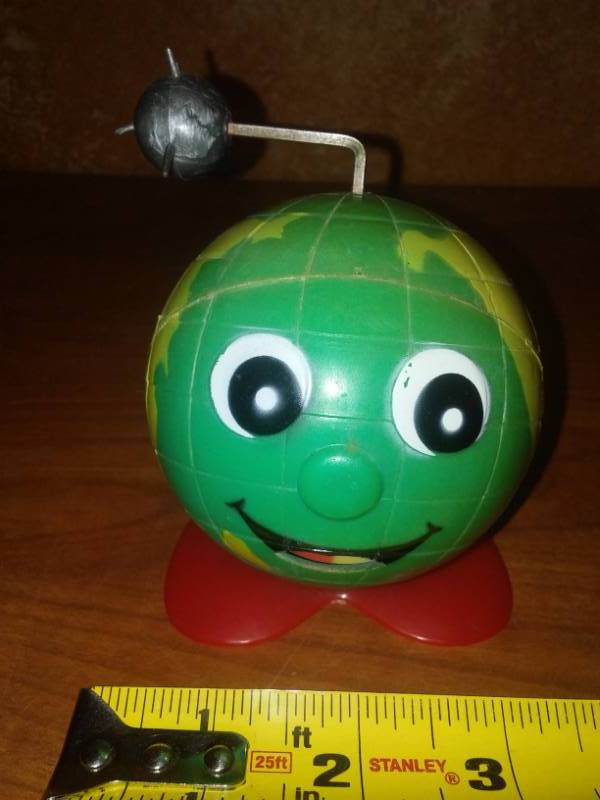 lot 145 image: Earth wind-up toy