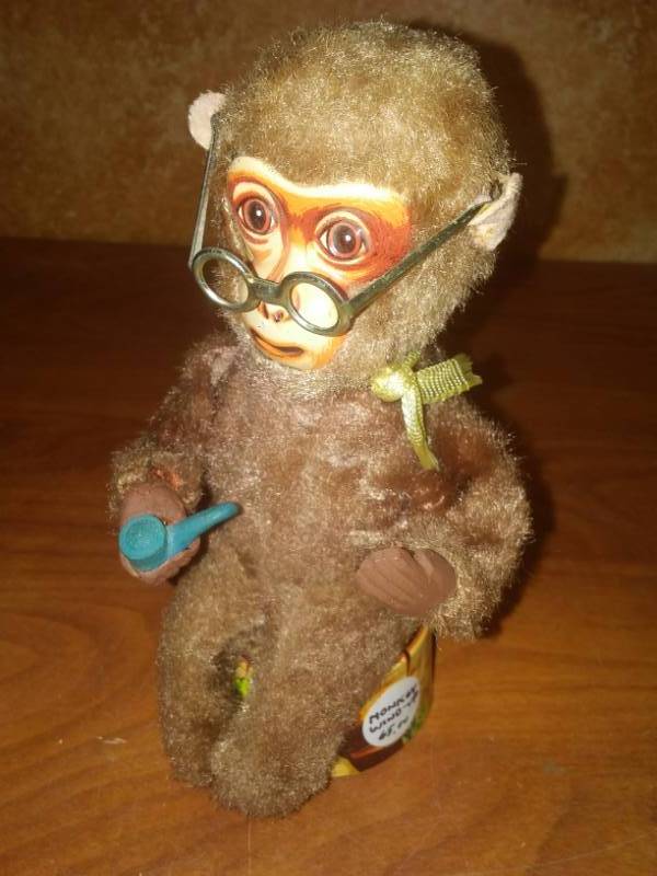 lot 146 image: Vintage monkey wind-up toy,