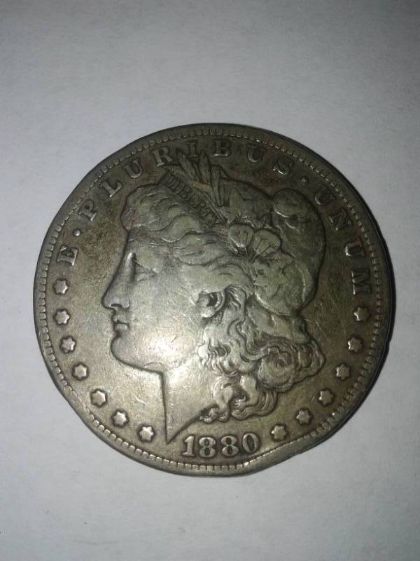 lot 100 image: Morgan silver dollar 1880.