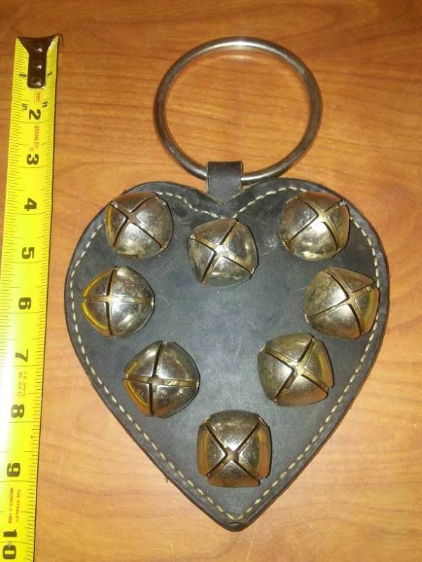 lot 102 image: Leather and bells for horse breastplate