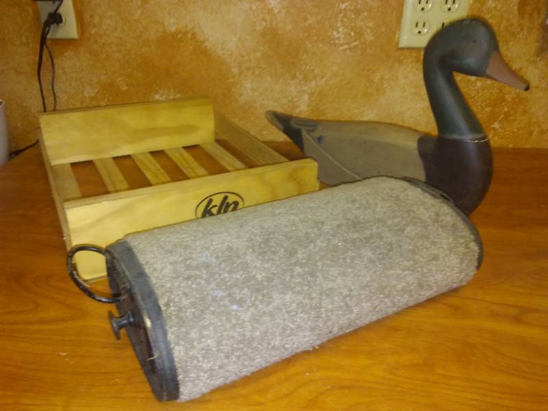 lot 116 image: Miscellaneous Boyds wood duck, vintage coal heater and crate.