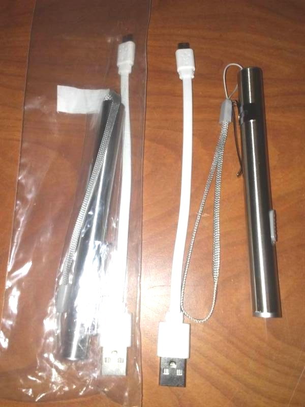 lot 119 image: New 12,000 Lumens LED rechargeable flashlight (2)