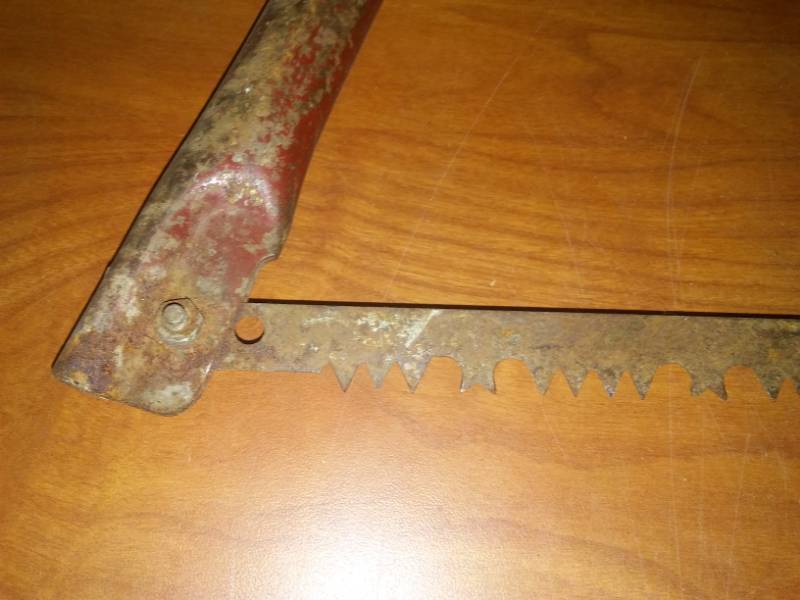 lot 191 image: 36 inch bow saw, tree, lumberjack.