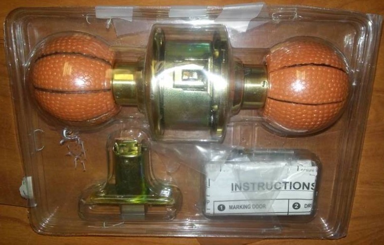 lot 209 image: Basketball doorknob handle set - new.
