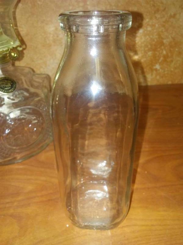 lot 211 image: New oil lamp, too milk bottles and Tin.