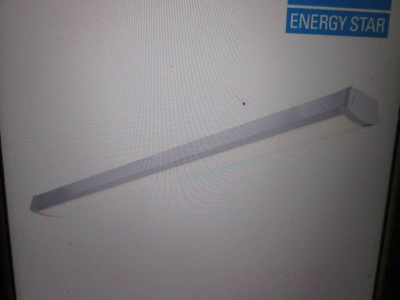 lot 28 image: Lithonia Lighting 4 ft Integrated L...