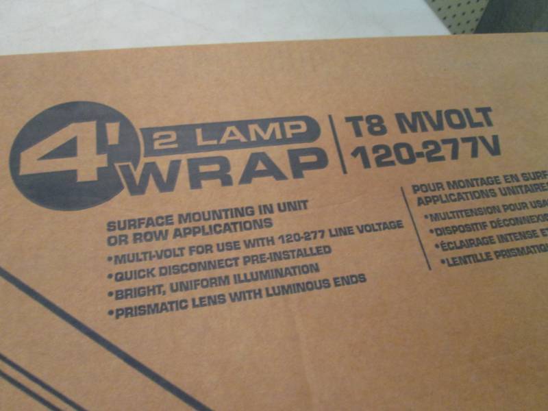lot 38 image: Lithonia Lighting 4 ft Multi-Volt 2...