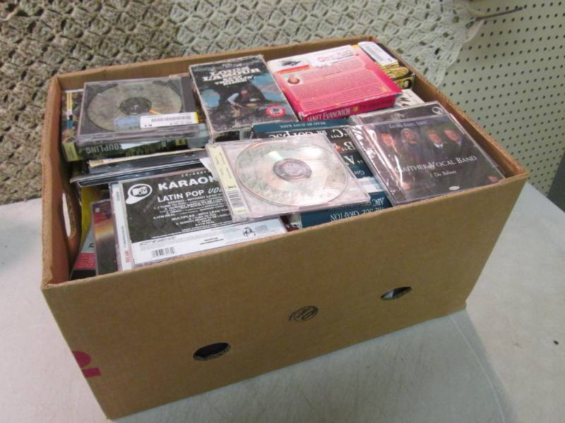 lot 58 image: Box Full of CDs Etc.  CLR...