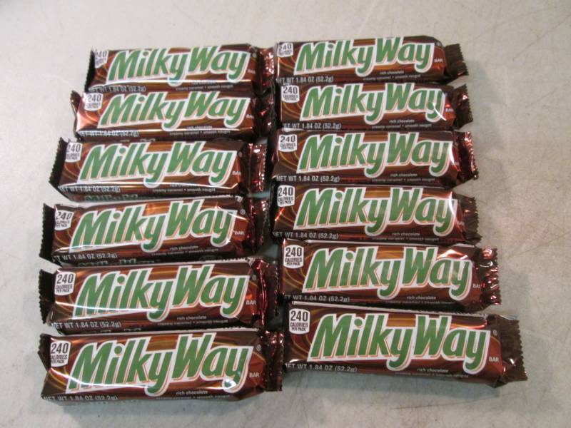 lot 114 image: 12 Milky Way Candy Bars Best by Apr...