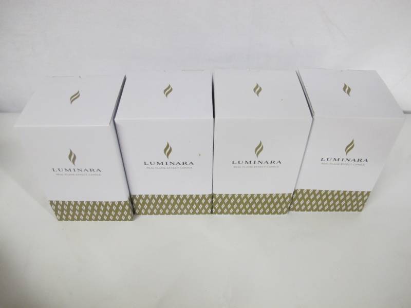 lot 49 image: 4 Pack of 7 Luminara Classic Pillar Flameless Candles with Real-Flame Effects - Each Comes with Remote