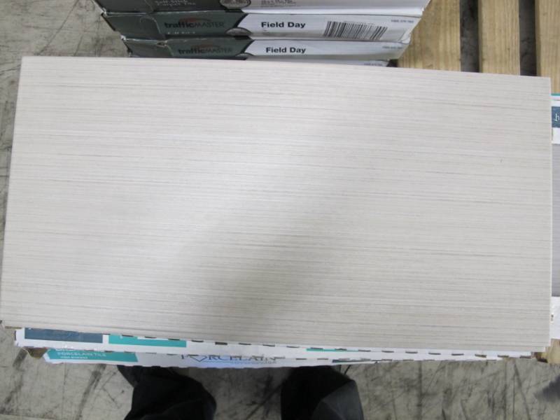 lot F30 image: 9 Boxes of Harmonics Porcelain Tiles in Linen Beige 12 x 24 Tiles - 5 per Box