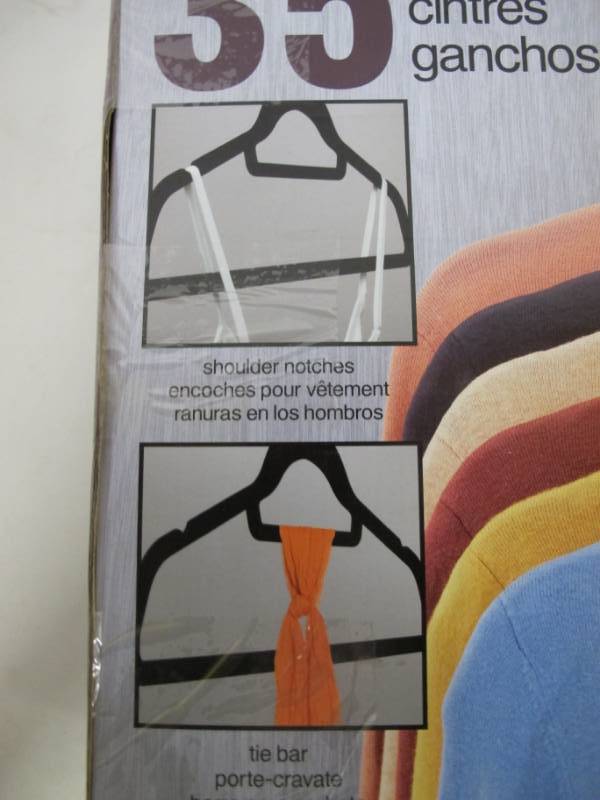 lot 76 image: Pack of 35 Non-Slip Flocked Hangers with Shoulder Notches and Tie Bars