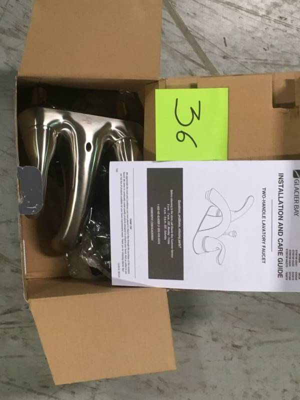 lot 36 image: Glacier Bay Builders 4 in. Centerset 2-Handle Low-Arc Bathroom Faucet in Brushed Nickel in very good condition