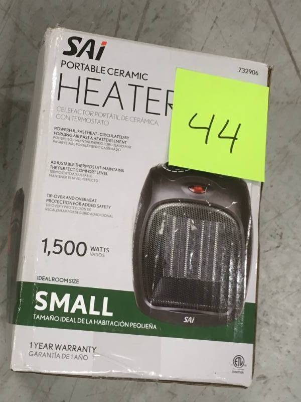 lot 44 image: 1,500-Watt Convection Electric Portable Heater and Fan in very good condition