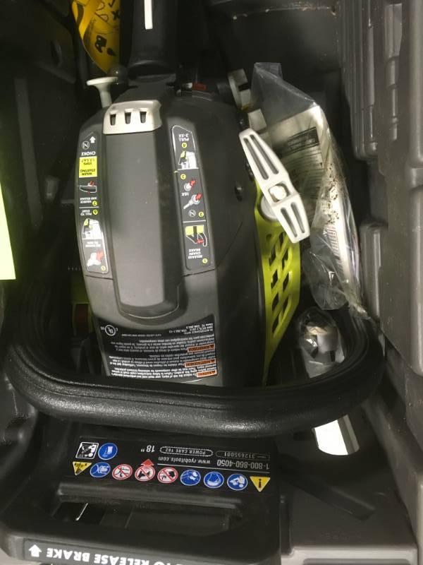 lot 72 image: RYOBI 18 in. 38cc 2-Cycle Gas Chainsaw with Heavy Duty Case in very good condition