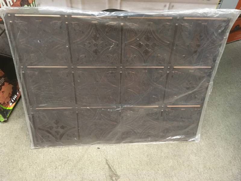 lot 92 image: Fasade Traditional 1 18.5-in x 24.5-in Oil-Rubbed Bronze Backsplash Panels in very good condition