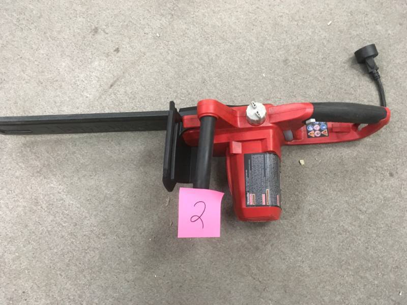 lot 2 image: Homelite 16 in. 12 Amp Electric Chainsaw in good condition