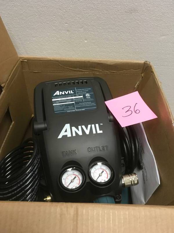 lot 36 image: ANVIL 2G Pancake Air Compressor with 7-Piece Accessories Kit in good condition