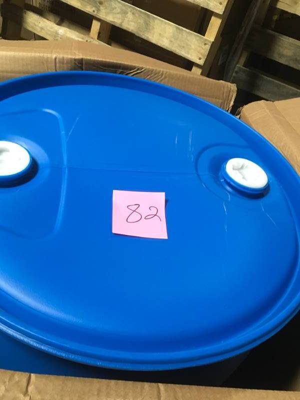 lot 82 image: EarthMinded 55 Gal. Blue Plastic Drum DIY Rain Barrel Bundle with Diverter System in good condition