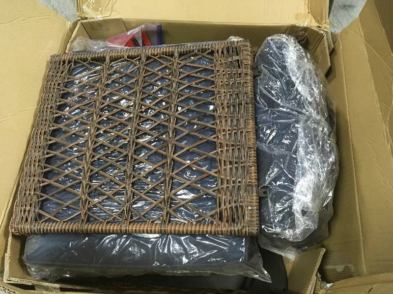 lot 1 image: Hampton Bay Cambridge Brown Stationary Wicker Outdoor Lounge Chair with Blue Cushions not used