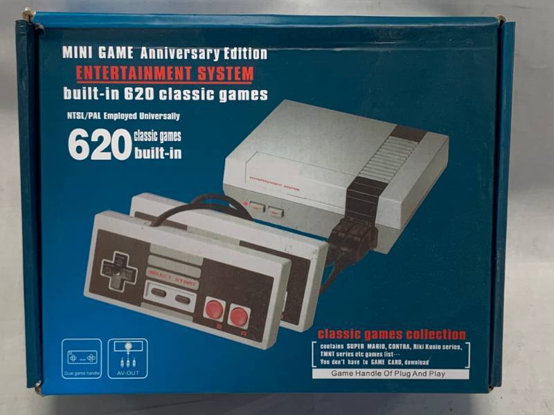 lot 58 image: Mini Entertainment Game System with 620 Games