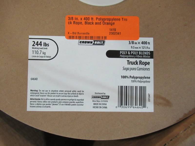lot 78 image: Crown Bolt 38 in. x 400 ft. Polypropylene Truck Rope, Black and Orange, 64640 - New in Box
