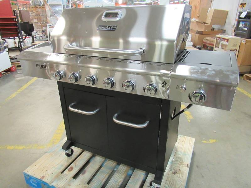 lot 3 image: Nexgrill Deluxe 6-Burner Propane Gas Grill in Black with Side Burner 720-0898 - Missing Grates - Never Used - Small dent on lid.