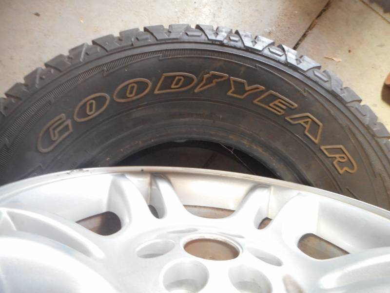 lot 12 image: Goodyear Wrangler TireRim