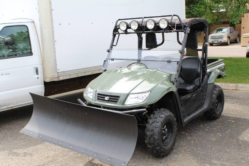 lot 369 image: 2013 Kymco UXV 500i 2-Seat ATV with Snowplow Attachment, 4-Lamp Overhead Lighting, Utility Deck