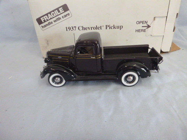 lot 15 image: Danbury Mint 1937 Chevrolet Pickup Die Cast Truck