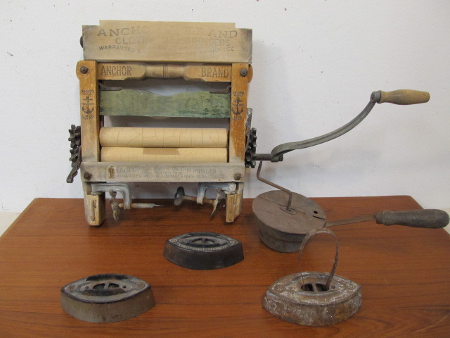 lot 71 image: Antique Primitive Wringer Washer Irons etc